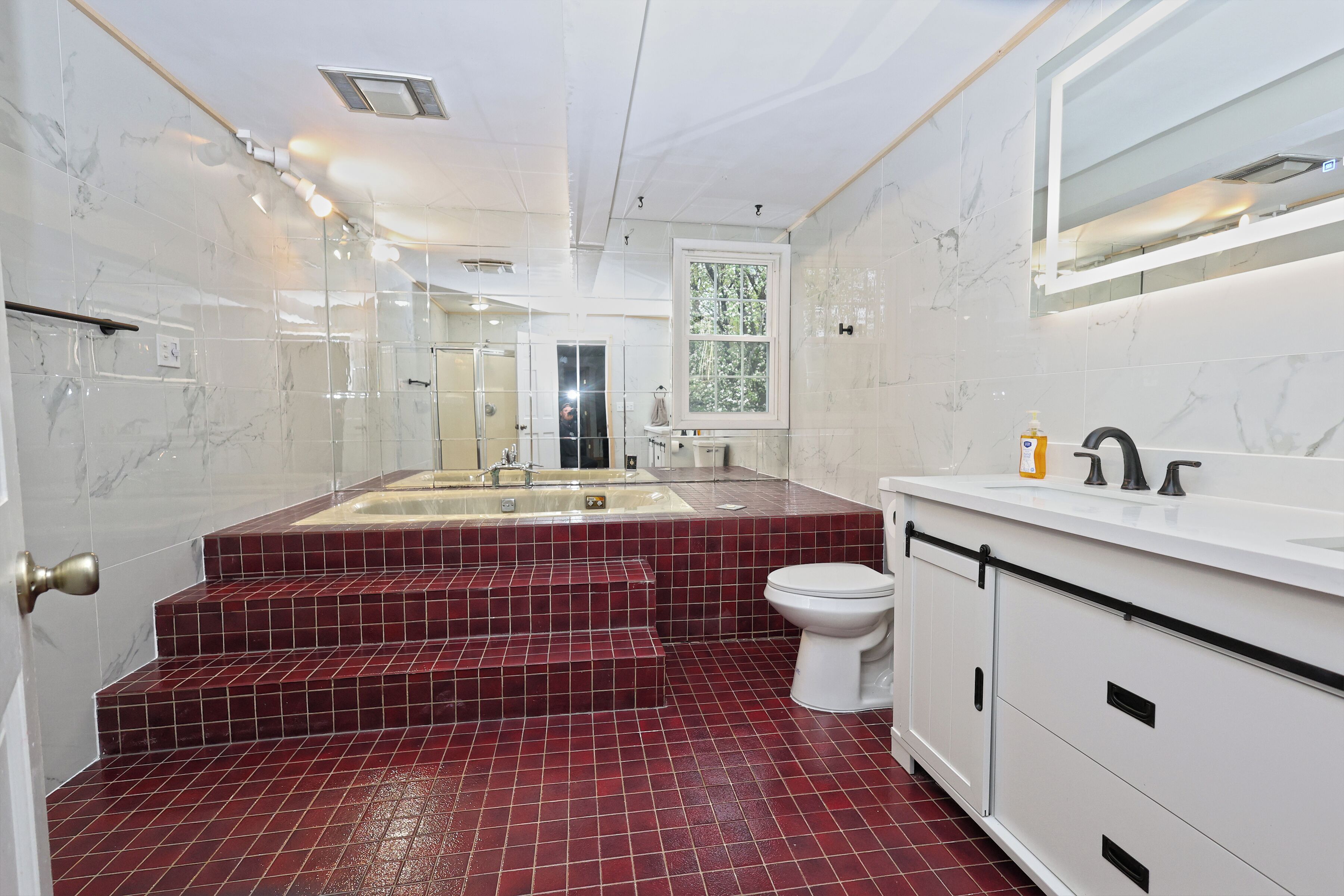 Shower, towels, soap, toilet paper