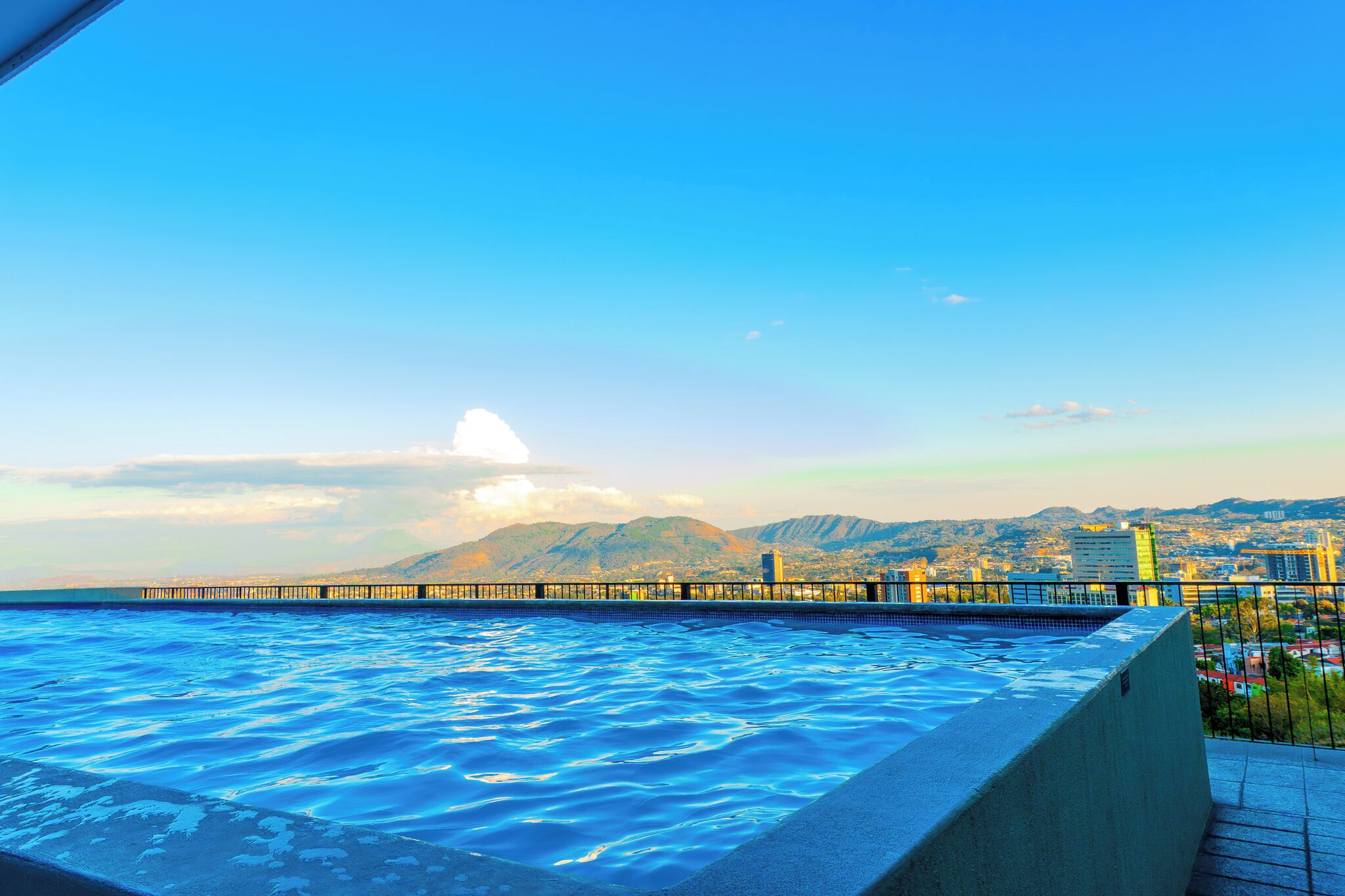 Outdoor pool, open 5:00 AM to 10:00 PM, sun loungers