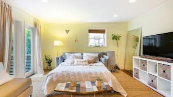 1 bedroom, desk, iron/ironing board, travel crib