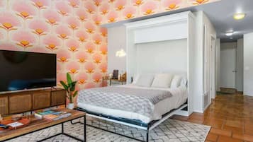 2 dormitorios, tabla de planchar con plancha, cuna de viaje y wifi