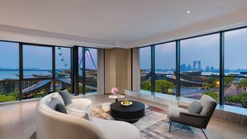 Suite, 1 King Bed, Lake View | Laptop workspace, free WiFi, bed sheets