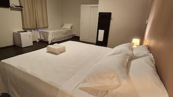 Suíte standard | 15 quartos, escrivaninha, Wi-Fi de cortesia