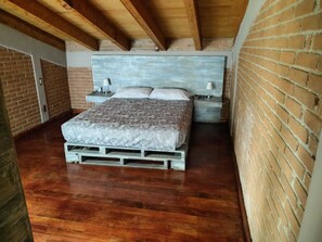 Vila standard, 1 cama Queen e sofá-cama, vista para a piscina | Frigobar, ferros/tábuas de passar roupa, Wi-Fi de cortesia