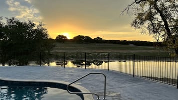 Outdoor pool, open 9:00 AM to 10:00 PM, pool umbrellas, sun loungers