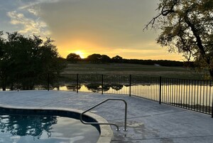 Outdoor pool, open 9:00 AM to 10:00 PM, pool umbrellas, sun loungers