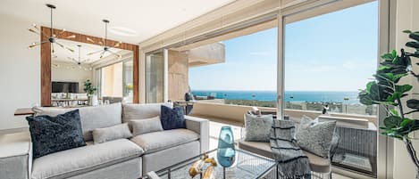 Deluxe Apartment, 2 Bedrooms | Living area | 55-inch Smart TV with digital channels, Netflix, streaming services