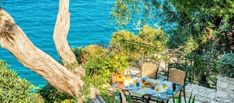 Loggos Bliss: Aglaia Villa's charm and sea views await your stay.