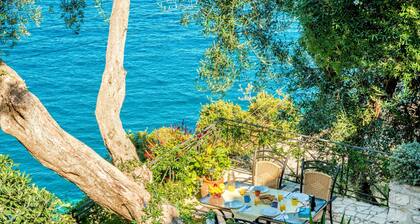 Loggos Bliss: Aglaia Villa's charm and sea views await your stay.