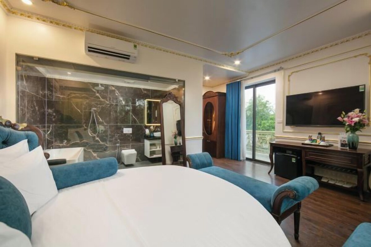 Premium bedding, free minibar items, desk, blackout curtains