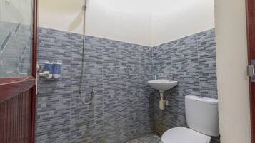 Quarto luxo | Banheiro | Chuveiro, toalhas de banho