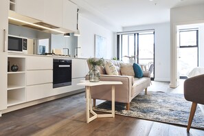 Deluxe Apartment | Living area - Mega Style Apartments - The Marc (St Kilda)