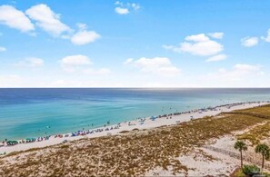 On the beach, sun-loungers, beach towels