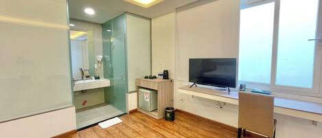 Deluxe Quadruple Room, 2 Queen Beds | Bathroom | Free toiletries, hair dryer, bathrobes, slippers