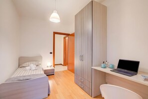 Family Apartment, Multiple Bedrooms, 2 Bathrooms (Magnolia - New Apartment Laveno) | 2 bedrooms, in-room safe, laptop workspace, iron/ironing board - Magnolia - New Apartment Laveno Center (Laveno Mombello)