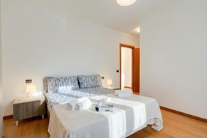 Family Apartment, Multiple Bedrooms, 2 Bathrooms (Magnolia - New Apartment Laveno) | 2 bedrooms, in-room safe, laptop workspace, iron/ironing board - Magnolia - New Apartment Laveno Center (Laveno Mombello)