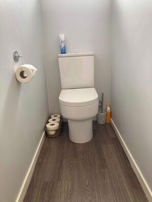 Shower, hair dryer, towels, shampoo