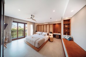 A modern bedroom with a large bed, a ceiling fan, a bedside table, a bench, and a view of the outdoors. - Kolila Villa Seminyak by Ini Vie Hospitality (Kerobokan)