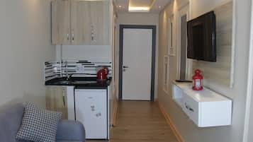 شقة ديلوكس | مطبخ صغير خاص | كرسي للأطفال، مناشف ورقية