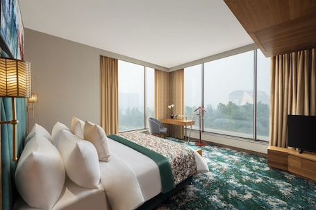 Suite, 1 King Bed | Premium bedding, in-room safe, individually decorated