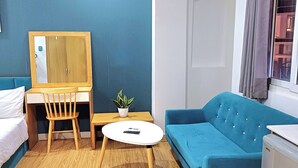 Chambre Double | Coin séjour
