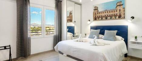 1 bedroom, desk, iron/ironing board, travel cot