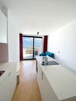 Executive Penthouse, Vision Accessible, Sea View | Private kitchen | Mini-fridge, microwave
