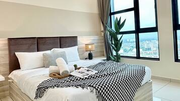 A modern hotel room with a large bed, two bedside lamps, a view of the city, and a large window.