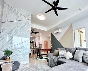 Family Apartment, 3 Bedrooms, Accessible, Balcony | Living area | 48-inch Smart TV with cable channels, video-game console, Netflix - Ong Kim Wee Residence (Malacca City)