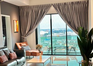 Family Apartment, 3 Bedrooms, Non Smoking, City View | Living area | 48-inch Smart TV with cable channels, video-game console, Netflix - Ong Kim Wee Residence (Malacca City)