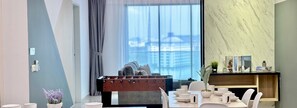 Family Apartment, 3 Bedrooms, Accessible, Balcony | Living area | 48-inch Smart TV with cable channels, video game console, Netflix - Ong Kim Wee Residence (Malacca City)
