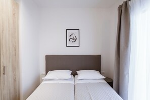 1 chambre, coffres-forts dans les chambres, fer et planche à repasser