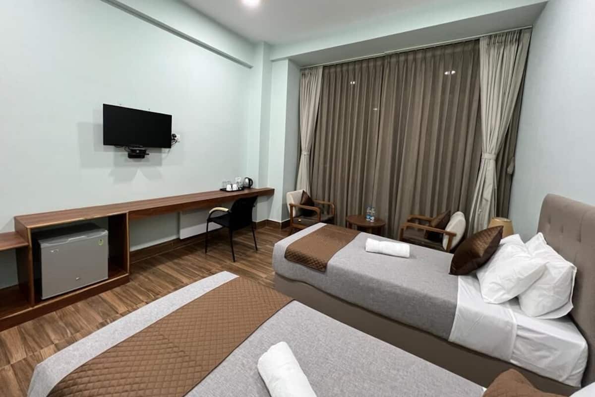 Camera Deluxe con letto matrimoniale o 2 letti singoli | Minibar, con stile personalizzato, insonorizzazione, ferro/asse da stiro