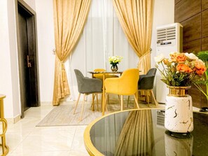 Executive Room | Living area | Flat-screen TV, stereo