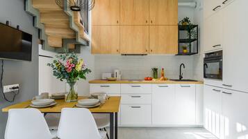 Apartment | Private kitchenette | Fridge, oven, stovetop, dishwasher