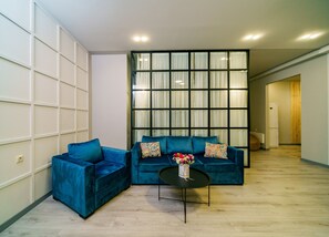 Exclusive Apartment, 2 Bedrooms, Kitchen, City View | Living area | 100-cm Smart TV with cable channels - Rooftop City View apartments (Yerevan)