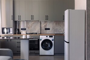 Fridge, microwave, stovetop, cookware/dishes/utensils