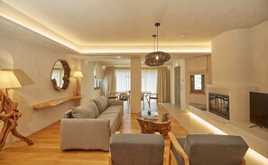 Panoramic Villa | Living area | 50-inch Smart TV with digital channels, fireplace, Netflix - Sunrise Garden Hills (Zagora-Mouresi)