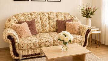 Classic Apartment | Living area | 116-cm LCD TV with cable channels