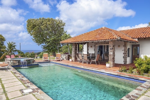 Spanish-style Ocean View Villa Set In Garden - Calypso Court 3 Bedroom Villa by RedAwning