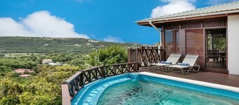 Charming Cottage Located In Cap Estate - Orchid Cottage 1 Bedroom Home by RedAwning