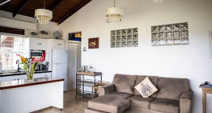 Charming Cottage Located In Cap Estate - Orchid Cottage 1 Bedroom Home by RedAwning