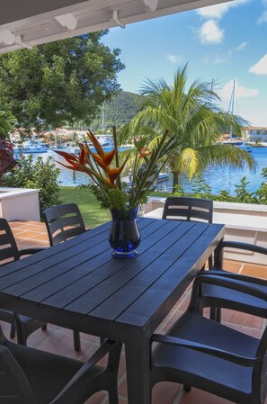 Outdoor dining - The Anchorage #5 a 2 bedroom Waterfront Condo in Rodney Bay 2 Condo by RedAwning (Gros Islet)