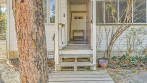 A wooden front porch leading to a door with a 'WELCOME' sign. - Ruidoso Retreat w/ Grill ~ 3 Mi to Grindstone Lake (Ruidoso)