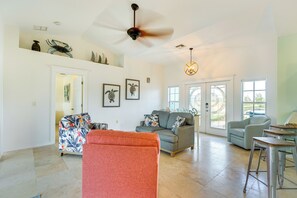 House (4 Bedrooms) | Interior - Pool w/ Waterfall: Colorful Cape Coral Gem! (Cape Coral)