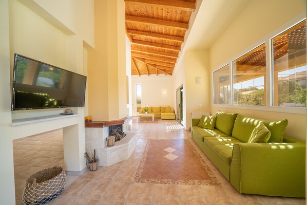 TV, fireplace - Aroma Kefalonias Villa (Metaxata, Kefalonia)