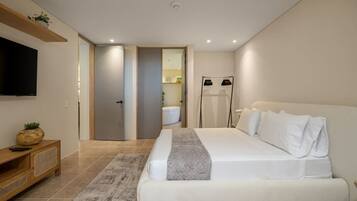 1 bedroom, desk, iron/ironing board, travel crib