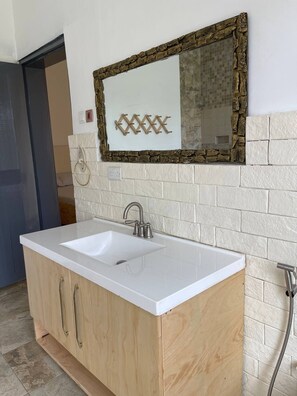 Shower, hair dryer, towels, soap - Power homes uganda (Kampala)