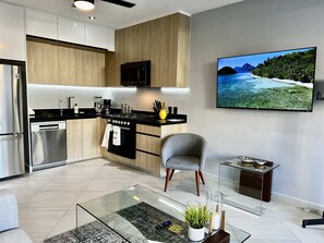 Fridge, microwave, coffee/tea maker, ice maker