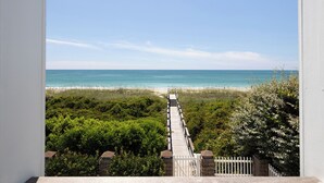 A pathway leading to a beach with a clear view of the ocean. - Bliss By The Beach, Oceanfront House in Emerald Isle, NC! (Emerald Isle)
