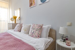 4 habitaciones, tabla de planchar con plancha, wifi y ropa de cama 